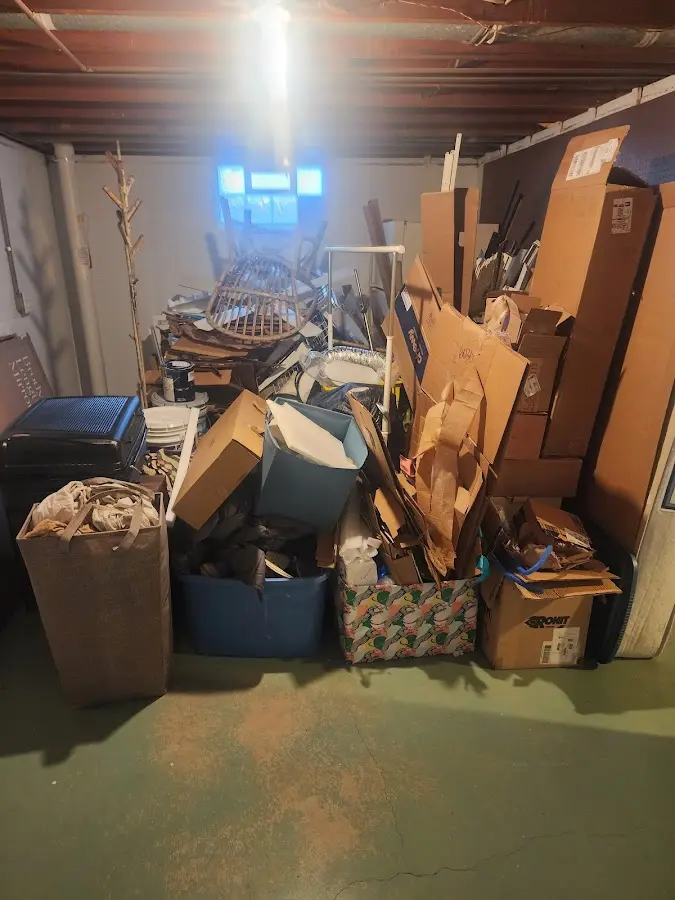 Roll-off dumpster container at job site for 8 Yard Dumpster Rental in Hartford City